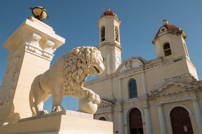 Cienfuegos, Cuba. On the main plaza a lion guarding the church