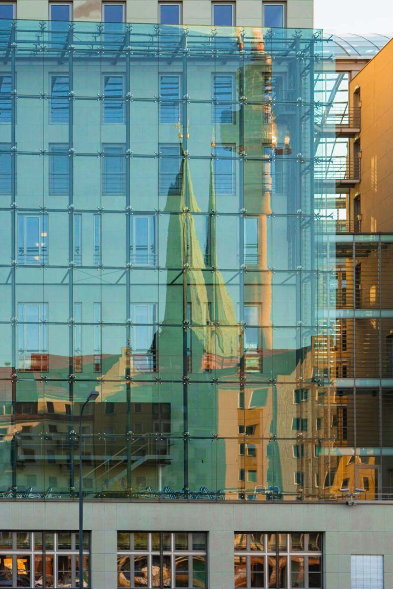 Reflection of the famous Berlin skyline in the newer office buildings along the River Spree